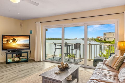 Experience the beauty of the bay from the living area, with views through the balcony