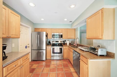 Our fully equipped kitchen features modern appliances, including a refrigerator, stove, oven, microwave, and dishwasher, as well as a variety of cooking utensils and cookware.