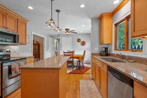 Open kitchen area into dining room