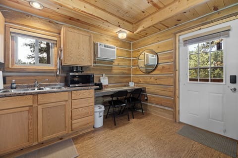 Kitchen includes toaster over and cooktop