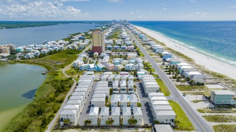 Enjoy the perfect beach getaway! This charming house is located just across the street from the shore, only a short walk to the sandy beach.