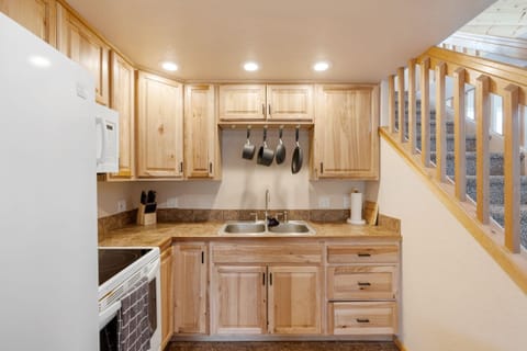 House 1 - Kitchen stocked with pots/pans/dinnerware, basic spices, coffee maker and coffee.