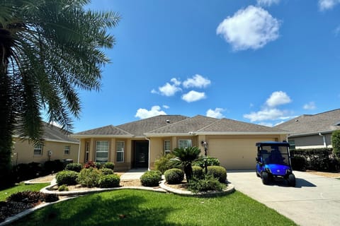 House Front with 2-Seater Golf Cart included.