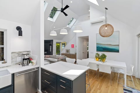 View from kitchen into dining area and living room