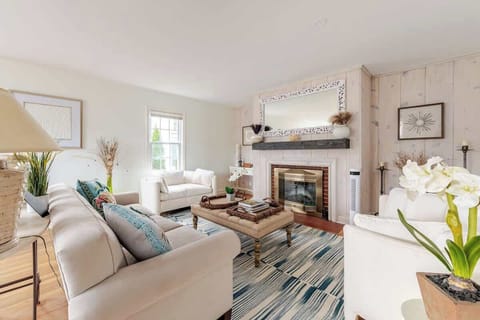 Gather the group in this formal living room. There’s another living room on the basement.