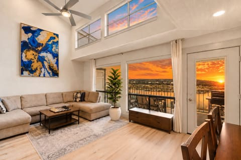 Watch the sun rise over Lake Travis from the living room or either of the privat