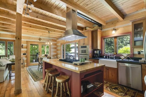Stainless Steel Appliances and Farmhouse Sink in the Kitchen
