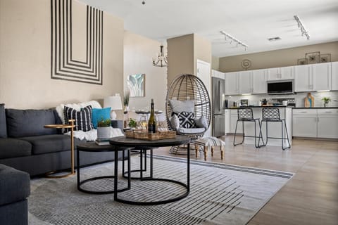 Welcome to our modernized bohemian vibes living room, where eclectic charm meets contemporary style for a truly inviting space