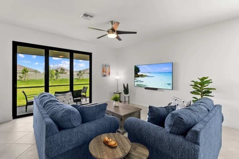 "Cozy Living Room with Scenic Backyard Views"