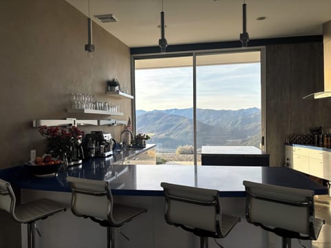 Kitchen also with breathtaking views -- mountain and valley in the rear