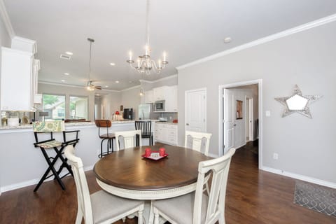 Dining with view towards kitchen - seating for 9 at table and bar