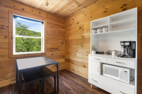 Coffee station with small dining table. Or, step outside on the deck.