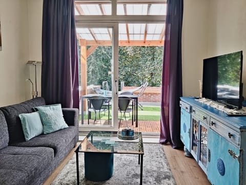 from the living room has access to the shared terrace as well.