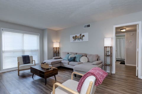 Sunlit Living Room with Comfortable Sectional Sofa