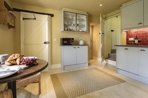 Ground floor: Enter via the boot room into the kitchen