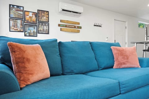 Living Room: Enjoy modern comforts in the eco-friendly ambiance of our home