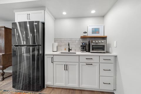 Prepare delicious meals in the sleek and modern kitchenette.