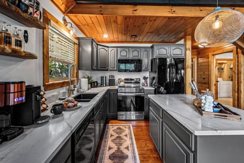 This fully stocked kitchen is ready for all of your needs, including spices, pots & pans, crock pot, toaster and more!