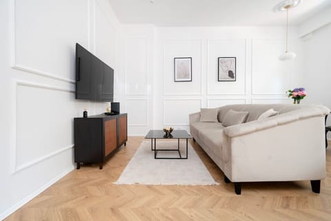 Living Room with Smart TV, Sofa and Dining Table | Book Now with RENTUJEMY.COM