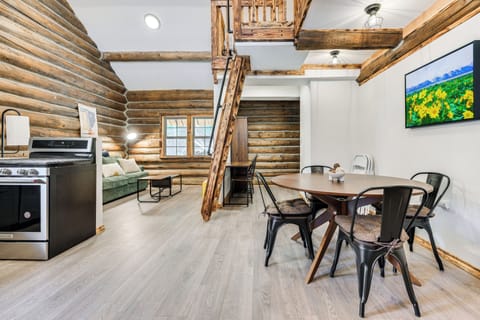 Living/Dining Area | 2-Story Cabin | Open Floor Plan | Electric Heating