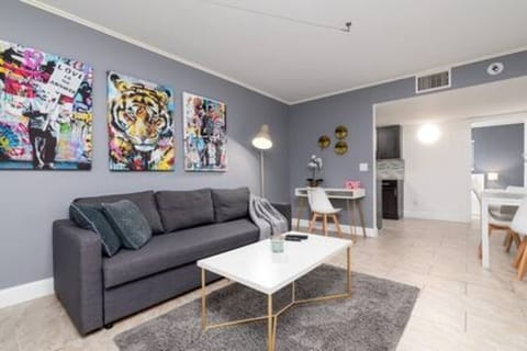 Great Open Living Room Space with Foldable Sofa and dedicated work space