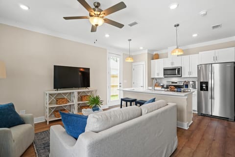 Open concept kitchen, dining and living room