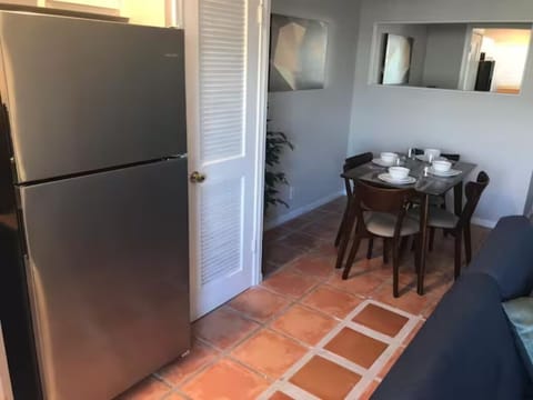 Kitchen with the dining table where you can enjoy your meals and snacks.