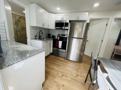 Embark on culinary adventures in our modern kitchen—a space where functionality meets style. Explore the joy of cooking surrounded by sleek design and contemporary amenities.