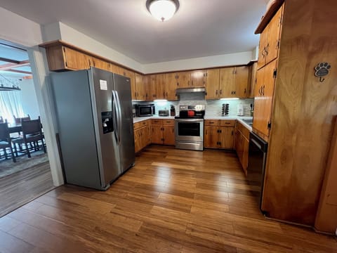 Well stocked kitchen, oven, spice rack, microwave, 4 slice toaster, dishwasher