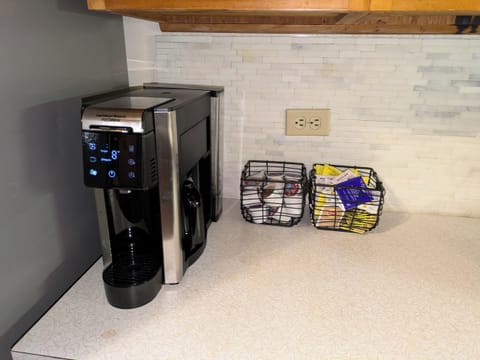 single serve + 12 cup carafe coffee maker, provided coffee options, decaf, & tea