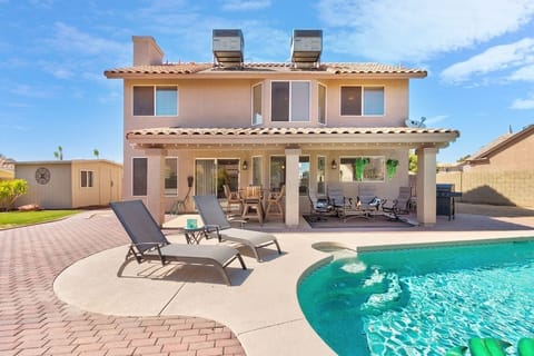 You've found Paradise in Peoria! Relax in the backyard with your friends and family. Splash in the pool and lounge on the patio furniture! Enjoy a nice BBQ dinner as you watch the sunset from a floaty in the pool! 