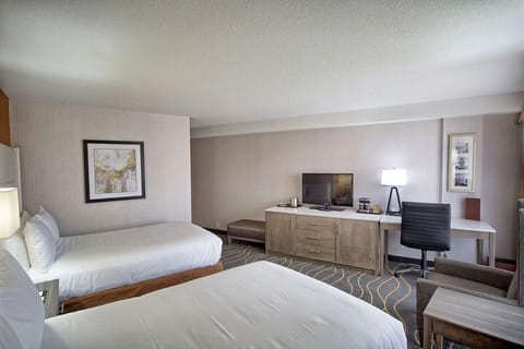 Unit with 2 Double beds. Exact unit will be assigned upon arrival. Views, colors, and decor may vary.