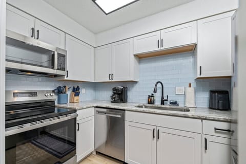 Prepare and cook your preferred dishes in this fully-equipped kitchen, stocked with all essential cooking utensils