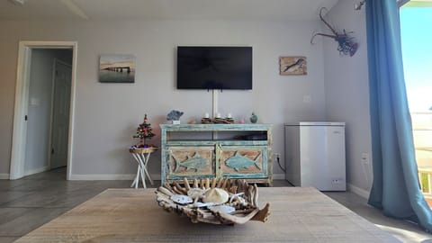 Smart TV & Complimentary Chest Freezer for Bait. 