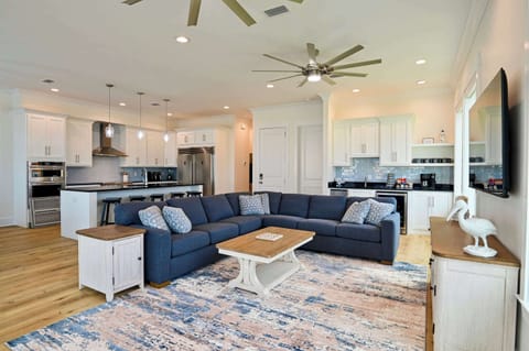 Curl up in the chic living room & stream your favorites on the smart TV