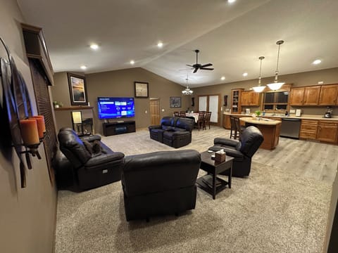Luxury Living Room With 85" Smart TV, Gas Fireplace, & Plenty of Space for All!