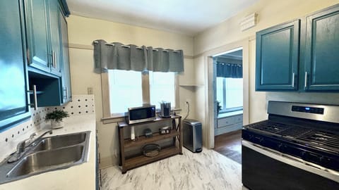 Coffee maker and microwave for your convenience.