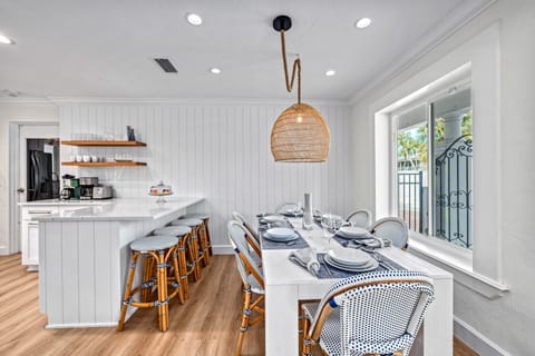 Picture lingering over a family-style dinner, wine glasses clinking, laughter echoing across this beautiful indoor gathering space.