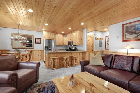 Timber Wolf Lodge 10 D has an open concept living room with kitchen and dining area next to it for a great place to gather.