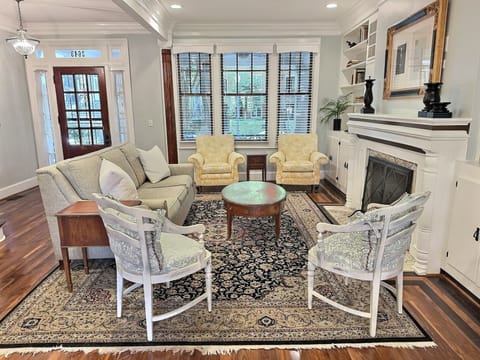 Comfortable living space with TV and plenty of seating.