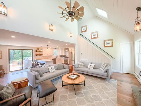 Living Room with Wood burning fireplace- 60` Smart TV