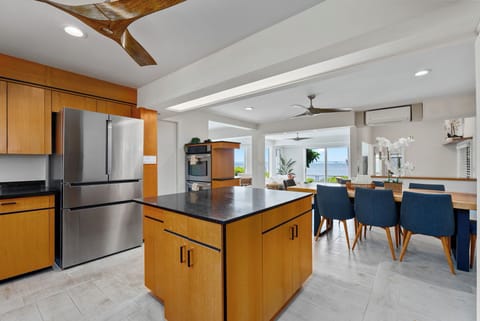 Even kitchen prep comes with ocean views, keeping you connected to the beauty outside.