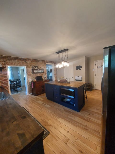 Fully stocked kitchen with large island.