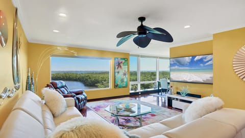 Spacious living area with panoramic views across Sarasota Bay.