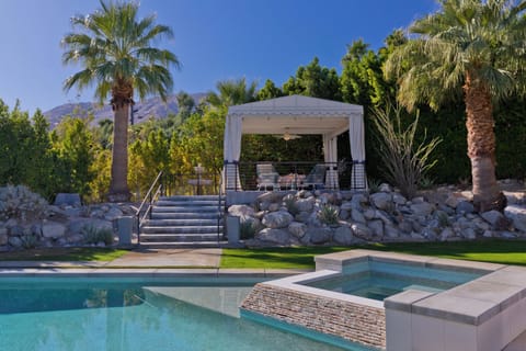 Elevated pergola for entertaining overlooking the pool 