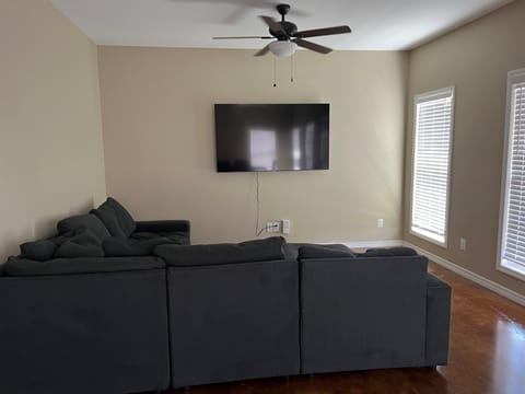 Living room with 70" Smart TV 