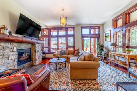 Gorgeous open living room with sweeping mountain views and comfortable furniture.