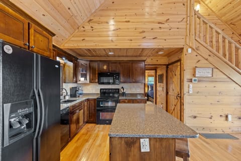 Features a large fridge and tons of counter space