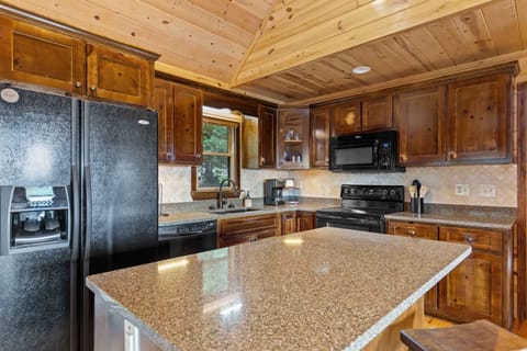 Features a large fridge and tons of counter space