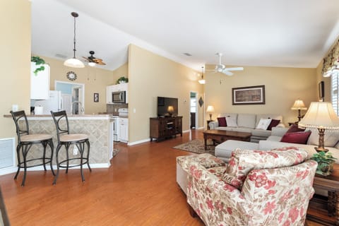 Living Room with TV & Kitchen breakfast bar